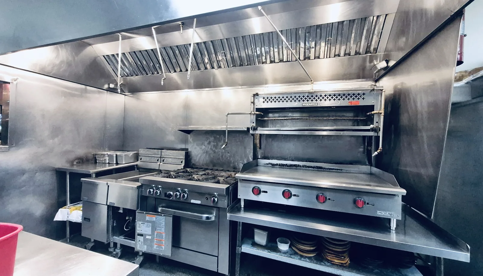 Restaurants commercial kitchen cleaning Restaurant cook line, griddle and exhaust hood cleaned to bare stainless by ARC
